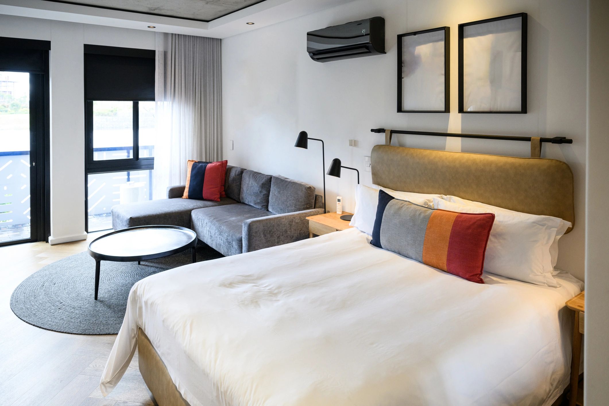 Contemporary hotel room with king bed